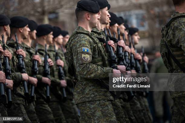 Members of the Kosovo Army march during the military parade on February 17, 2022 in Pristina, Kosovo. A decade after the 1998-99 war between ethnic...