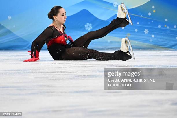 Russia's Kamila Valieva falls as she competes in the women's single skating free skating of the figure skating event during the Beijing 2022 Winter...