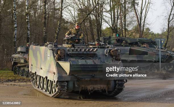 February 2022, Lower Saxony, Munster: A Bundeswehr M113 armored personnel carrier stands during an exercise at the military training area. Photo:...
