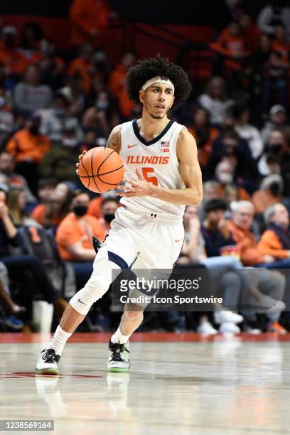 Andre Curbelo guard University of Illinois Fighting Illini dribbles across mid-court during a game with the Northwestern University Wildcats, Sunday,...