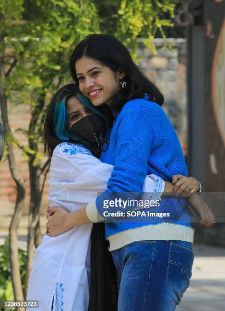 Students seen hugging on the first day of resumption at the college. Miranda House College for Women, north campus university of Delhi reopens after...