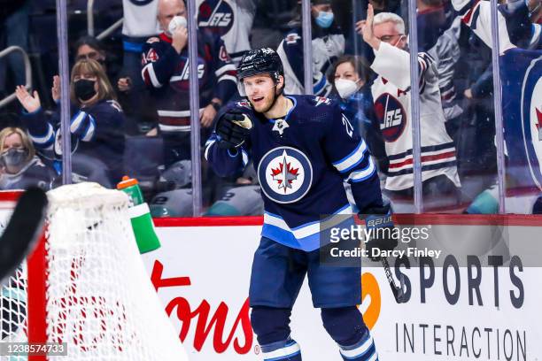 Dominic Toninato of the Winnipeg Jets celebrates his first period goal against the Seattle Kraken at the Canada Life Centre on February 17, 2022 in...