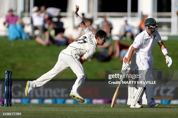 New Zealand's Matt Henry bowls past the South Africa's Aiden Markram during the day two of the first cricket Test match between New Zealand and South...