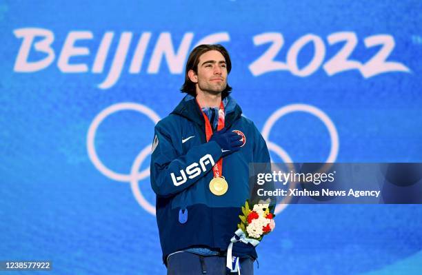 Gold medalist Alexander Hall of the United States reacts during the awarding ceremony of freestyle skiing men's freeski slopestyle at Zhangjiakou...