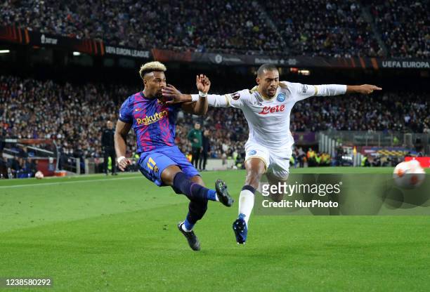 Adama Traore and Juan Jesus during the match between FC Barcelona and SSC Napoli, corresponding to the first leg of the knock-out play-off, played at...