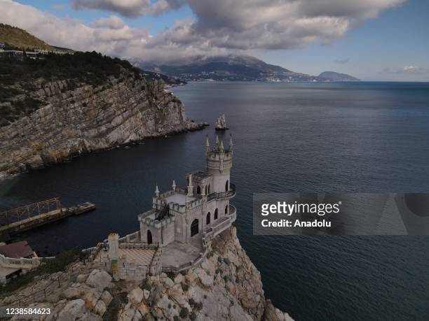 An aerial view of Swallow's Nest Castle is seen on Auroara Clif in Gaspro town of Crimea, Ukraine on February 7, 2022. Swallow Nest Castle, 40 meters...