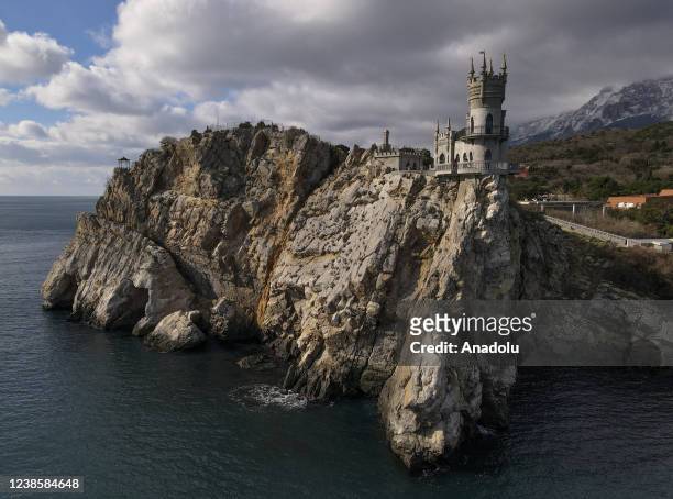An aerial view of Swallow's Nest Castle from the cliffs is seen on Auroara Clif in Gaspro town of Crimea, Ukraine on February 7, 2022. Swallow Nest...