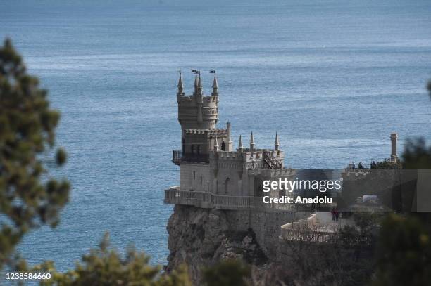 An aerial view of Swallow's Nest Castle is seen on Auroara Clif in Gaspro town of Crimea, Ukraine on February 7, 2022. Swallow Nest Castle, 40 meters...