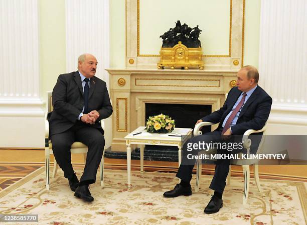 Russian President Vladimir Putin meets with his Belarus counterpart Alexander Lukashenko during their meeting at the Kremlin in Moscow on February...