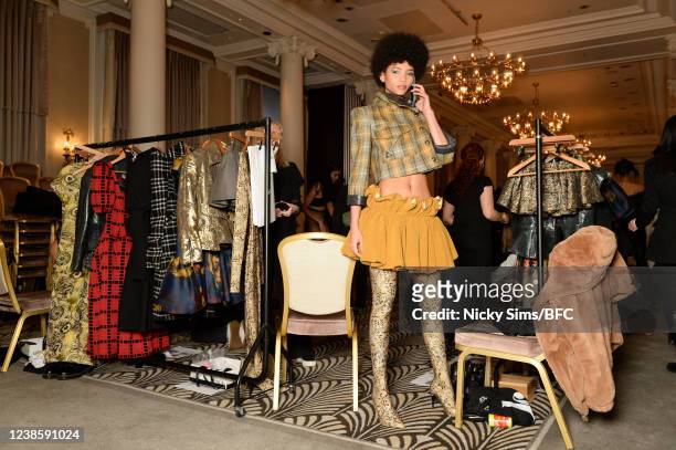 Model is seen backstage ahead of the Paul Costelloe show during London Fashion Week February 2022 on February 18, 2022 in London, United Kingdom.