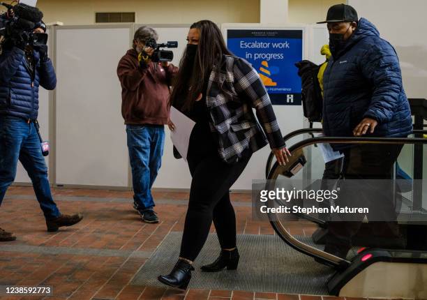 Daunte Wrights parents Katie Wright and Aubrey Wright arrive at the Hennepin County Government Center before the sentencing hearing for former...