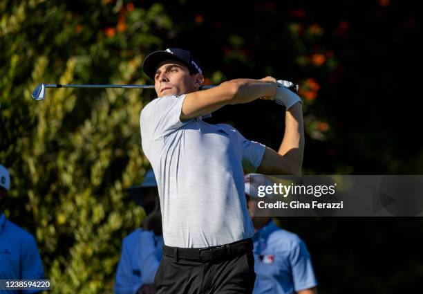 Leader Joaquin Niemann tees off on the 4th hole at the Genesis Open at Riviera Country Club on February 17, 2022 in Pacific Palisades, California. He...