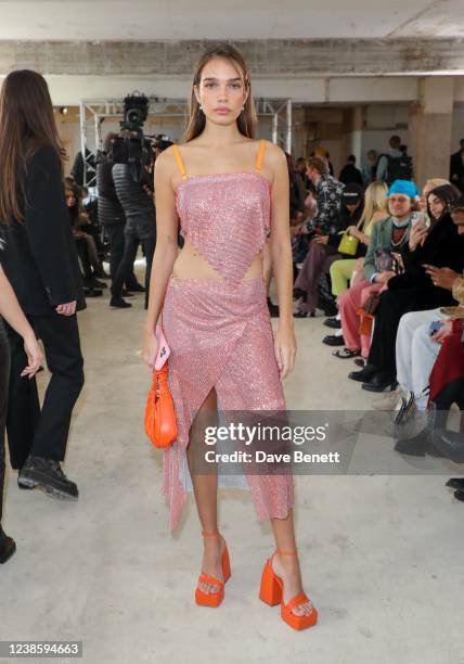 Hana Cross attends the Poster Girl AW22 show during London Fashion Week February 2022 on February 18, 2022 in London, England.