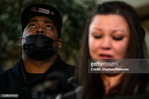 Aubrey Wright listens as Katie Wright , mother of Daunte Wright, speaks about the sentencing hearing for former Brooklyn Center police officer Kim...
