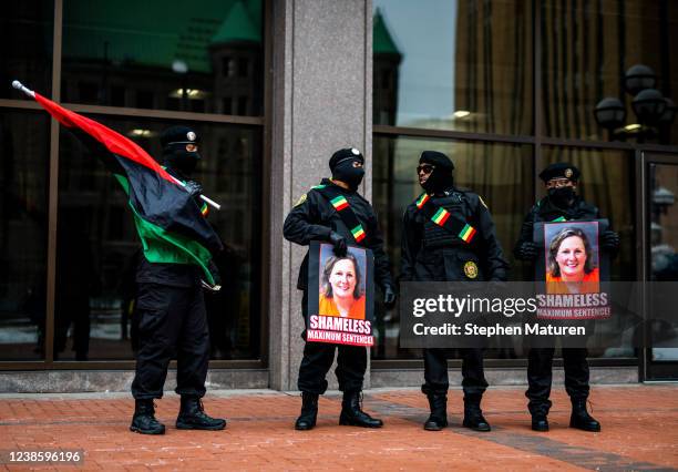 People demonstrate before the sentencing hearing for former Brooklyn Center police officer Kim Potter outside the Hennepin County Government Center...