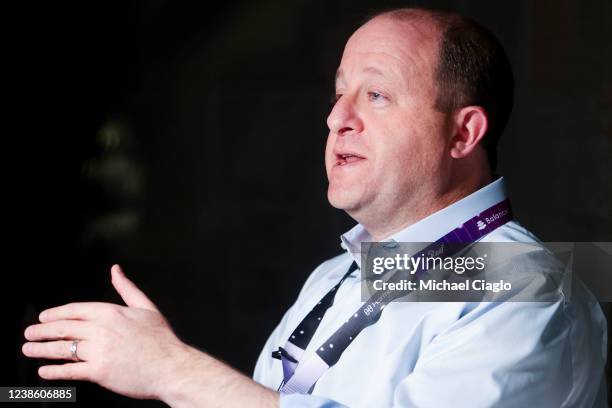 Colorado governor Jared Polis talks on a podcast at ETHDenver on February 18, 2022 in Denver, Colorado. ETHDenver is the largest and longest running...