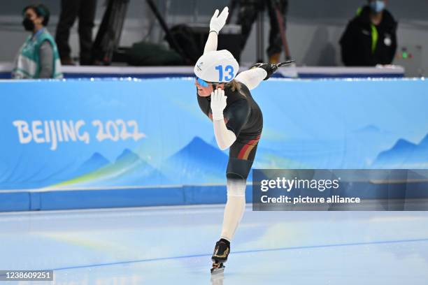 February 2022, China, Peking: Olympics, speed skating, mass start, women, final, National Speed Skating Oval, Claudia Pechstein of Germany makes...