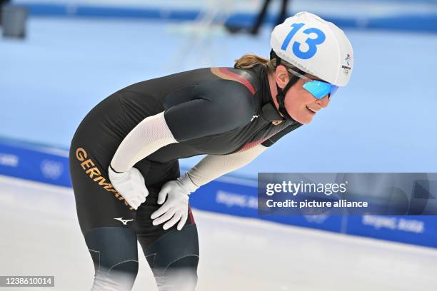 February 2022, China, Peking: Olympics, speed skating, mass start, women, final, National Speed Skating Oval, Claudia Pechstein of Germany smiles...