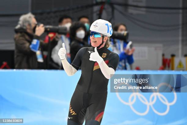 February 2022, China, Peking: Olympics, speed skating, mass start, women, final, National Speed Skating Oval, Claudia Pechstein of Germany reacts...