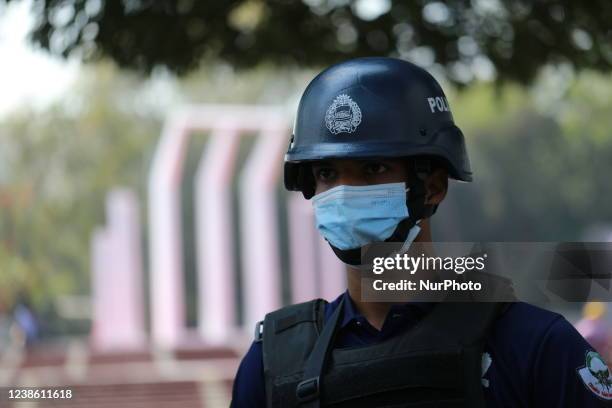 Member of SWAT team stands guard at the central Shaheed Minar ahead of the International Mother Language Day, in Dhaka, Bangladesh on February 19,...