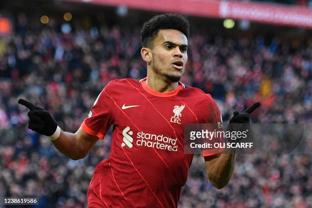 Liverpool's Colombian midfielder Luis Diaz celebrates after scoring their third goal during the English Premier League football match between...