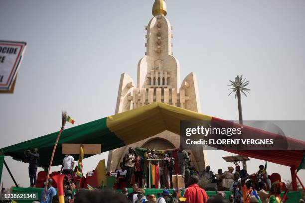 Adama Diarra, known as 'Ben the Brain', harangues the crowd from the Independence Monument, during a demonstration organised by the pan-Africanst...