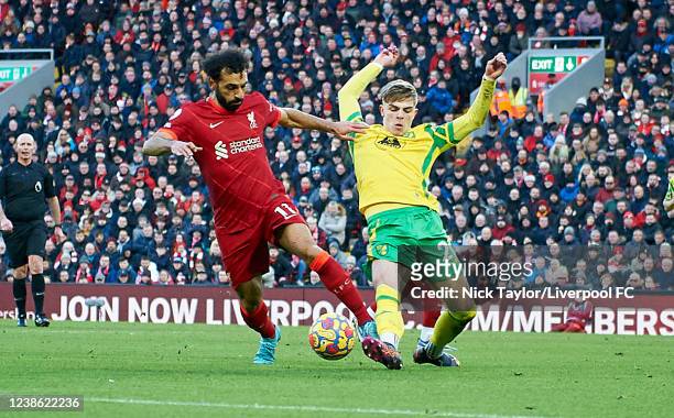 Mohamed Salah of Liverpool and Brandon Williams of Norwich in action during the Premier League match between Liverpool and Norwich City at Anfield on...