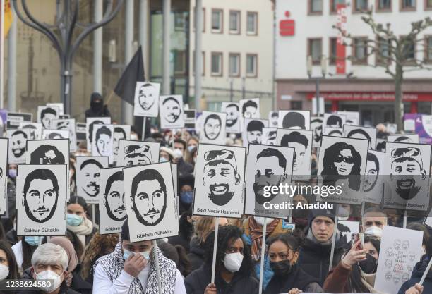 Thousands of people commemorate the victims of the 2020 mass shooting at a rally on the market square in Hanau, Germany on February 19, 2022. On Feb....
