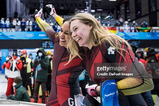 Laura Nolte of Germany, Deborah Levi of Germany in the finish at the 2 women's bobsleigh during Beijing 2022 Winter Olympic Games at National Sliding...