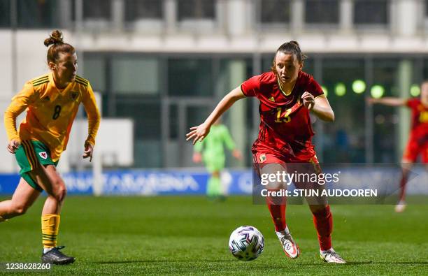 Angharad James of Wales defending on Belgium's Hannah Eurlings during the match Belgium vs Wales, second match of Belgium's national women's soccer...