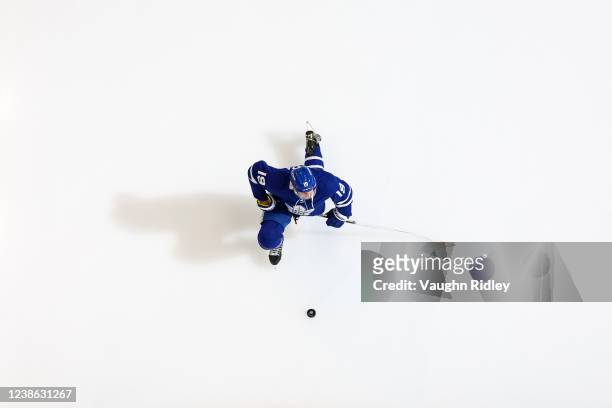 Jason Spezza of the Toronto Maple Leafs stretches during warm-ups before having the St. Louis Blues at the Scotiabank Arena on February 19, 2022 in...