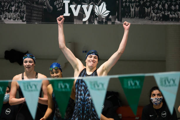 University of Pennsylvania swimmer Lia Thomas reacts after her team wins the 400 yard freestyle relay during the 2022 Ivy League Womens Swimming and...