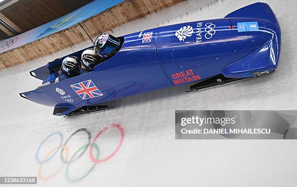 Britain's Brad Hall, Taylor Lawrence, Nick Gleeson and Greg Cackett compete in the 4-man bobsleigh event at the Yanqing National Sliding Centre...