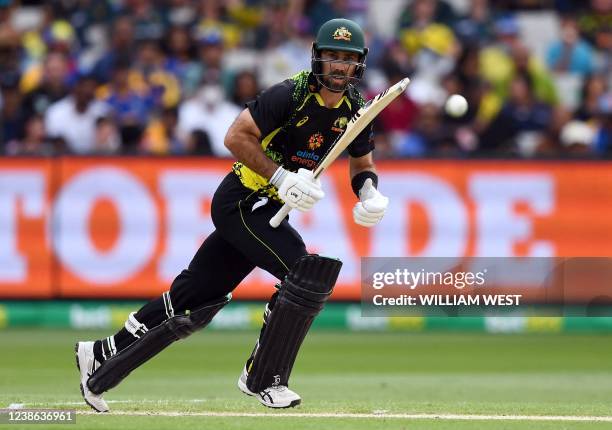 Australia's Glenn Maxwell takes a run from the Sri Lanka bowling during the fifth Twenty20 international cricket match at the Melbourne Cricket...