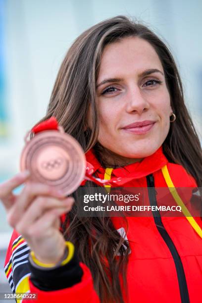 Belgian shorttrack skater Hanne Desmet poses with her bronze medal on the last day of the Beijing 2022 Winter Olympics in Beijing, China, Sunday 20...