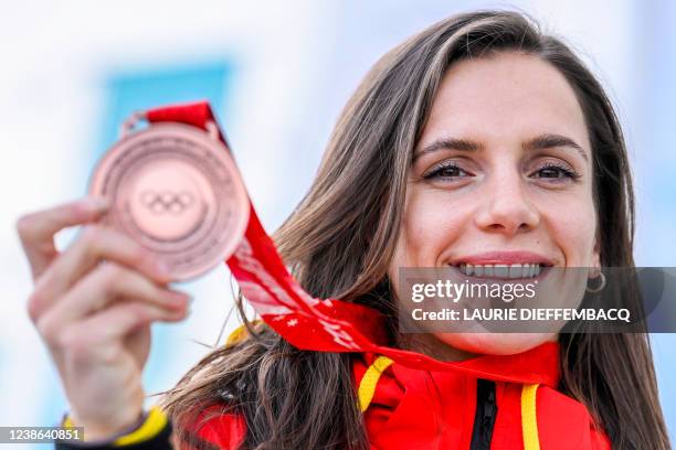 Belgian shorttrack skater Hanne Desmet poses with her bronze medal on the last day of the Beijing 2022 Winter Olympics in Beijing, China, Sunday 20...