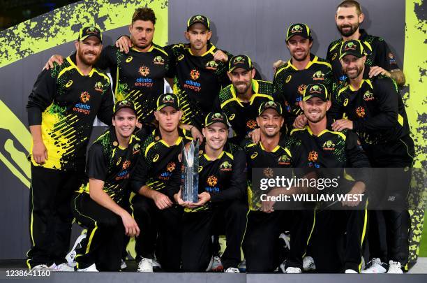 Australia players celebrate with the trophy after winning the series 4-1 against Sri Lanka after the fifth Twenty20 international cricket match at...