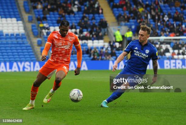 Blackpool's Dujon Sterling battles with Cardiff City's Isaak Davies during the Sky Bet Championship match between Cardiff City and Blackpool at...