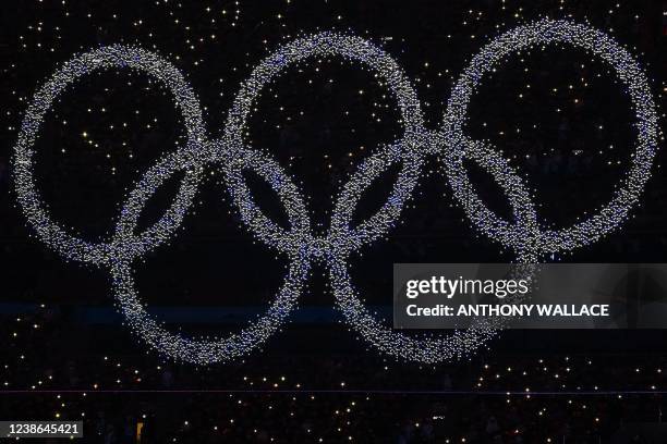 The Olympic rings are pictured during the closing ceremony of the Beijing 2022 Winter Olympic Games, at the National Stadium, known as the Bird's...