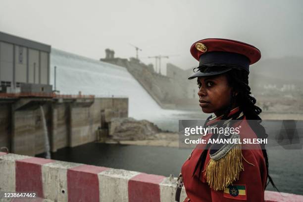 Member of the Republican March Band poses for photo before at the ceremony for the inaugural production of energy at the Grand Ethiopian Renaissance...