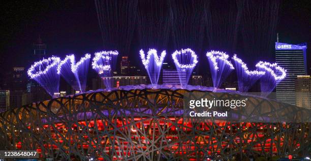 Fireworks explode over the Beijing National Stadium during the closing ceremony of the Beijing 2022 Winter Olympics on February 20, 2022 in Beijing,...