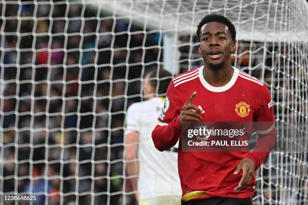 Manchester United's Swedish striker Anthony Elanga celebrates after scoring his team fourth goal during the English Premier League football match...