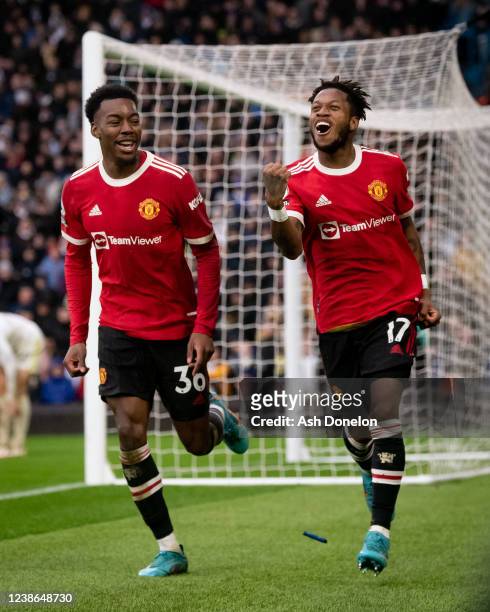 Fred of Manchester United celebrates scoring a goal to make the score 2-3 with Anthony Elanga during the Premier League match between Leeds United...