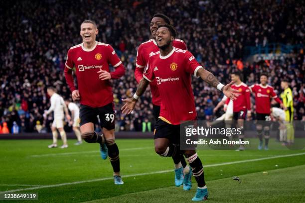 Fred of Manchester United celebrates scoring a goal to make the score 2-3 with Anthony Elanga and Scott McTominay during the Premier League match...