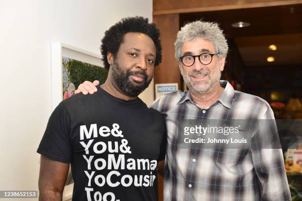 Authors Marlon James and Mitchell Kaplan pose for picture during an evening conversation moderated by William Johnson about James’s new book "Moon...