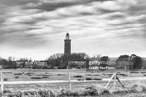 Black and White image of a lighthouse in the Netherlands. The West Head Lighthouse - Vuurtoren Westhoofd is a Dutch national monument open to the...