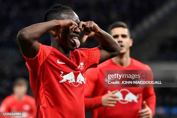 Leipzig's Malian midfielder Amadou Haidara celebrates scoring the 5-1 goal during the German first division Bundesliga football match between Hertha...