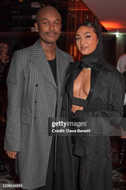 Maximilian Davis and Joy Crookes attend an event to celebrate the Maximilian Autumn/Winter 2022 collection in The Green Room at The Londoner Hotel on...