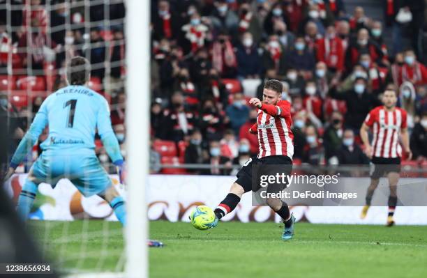 Iker Muniain of Athletic Bilbao scores his team's fourth goal during the La Liga Santander match between Athletic Club and Real Sociedad at San Mames...