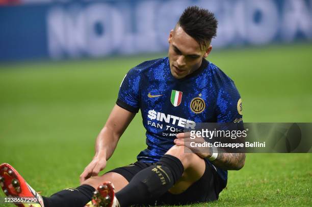 Lautaro Javier Martinez of FC Internazionale lies on the pitch after being injured during the Serie A match between FC Internazionale and US Sassuolo...